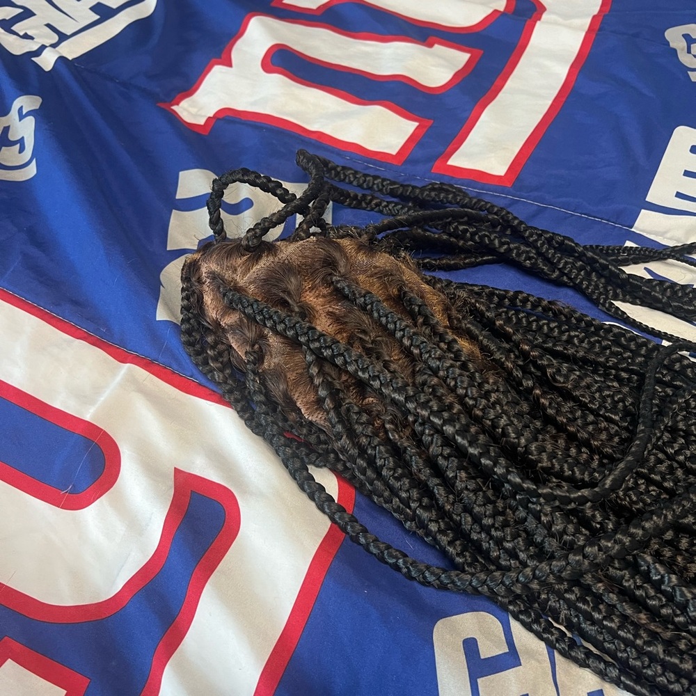 Black knotless lace front wig. Fits a small head.